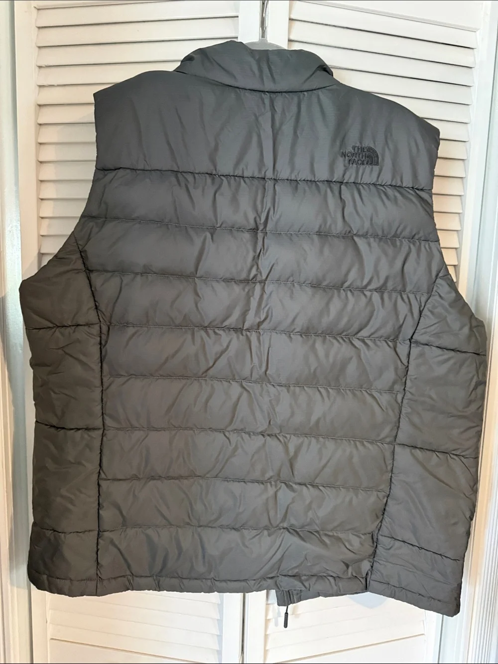 The North Face Men's Quilted Puffer Vest in Charcoal Gray